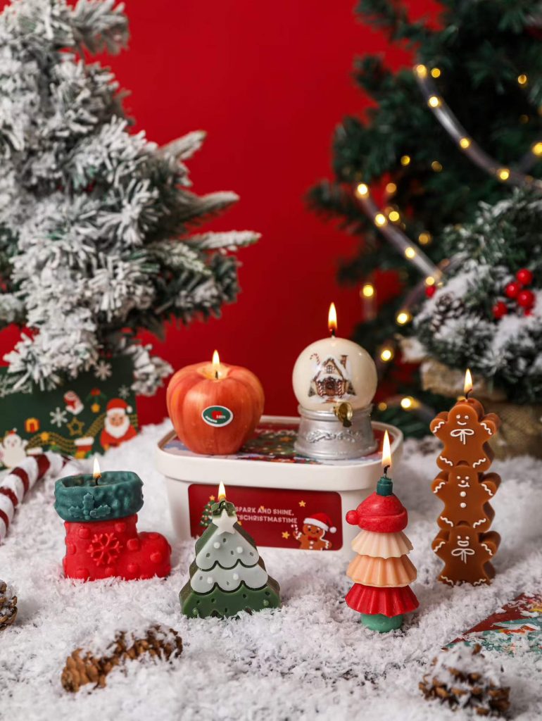Wholesale Christmas holiday soy candle collection display with snowman, gingerbread man, and tree candles