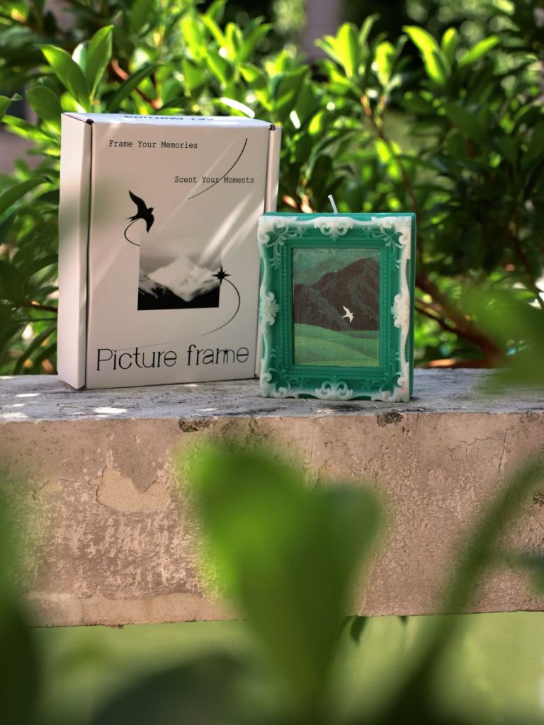 Custom green landscape oil painting picture frame soy candle with bespoke gift box packaging by Custom Candle Craft