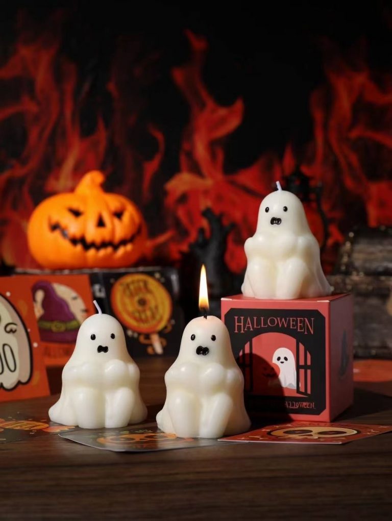 Custom white ghost pillar soy candles with Halloween packaging box manufactured by Custom Candle Craft
