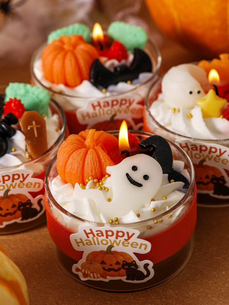 Halloween dessert parfait soy candles in glass cups with ghost and pumpkin toppers