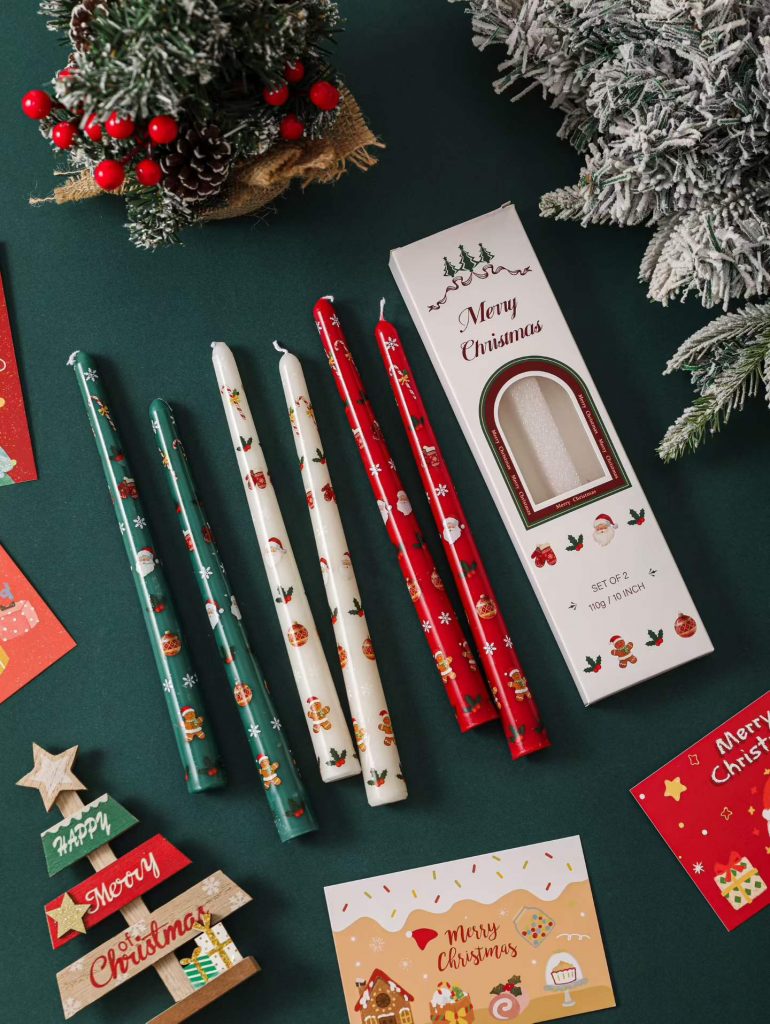 Hand-printed green and red Christmas taper candles with custom windowed packaging box