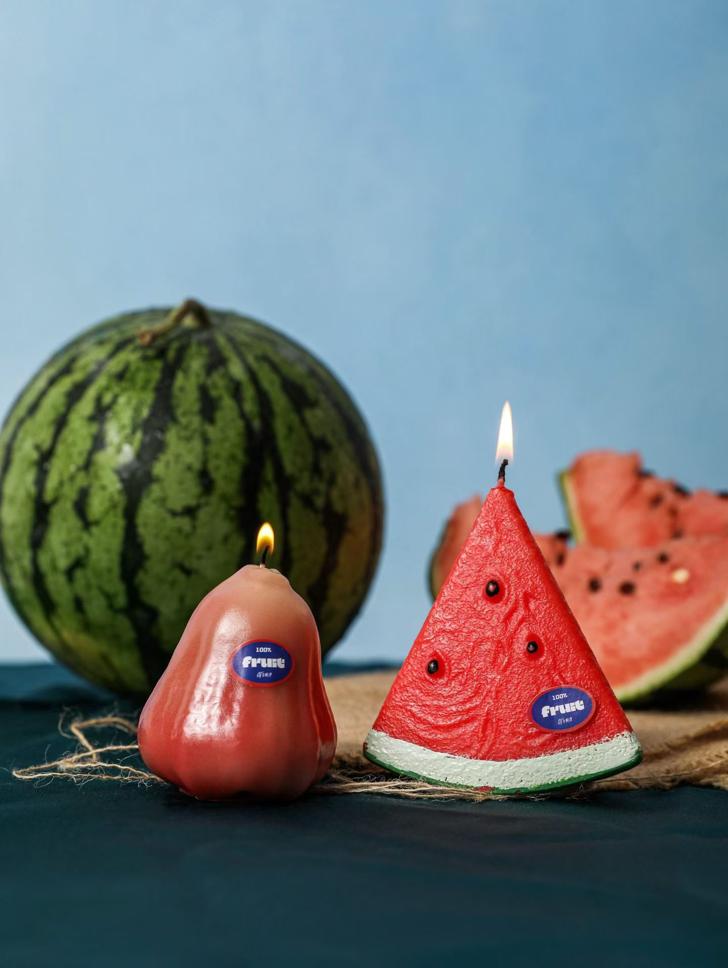Realistic watermelon slice and pear fruit soy candles for summer promotional gift lines
