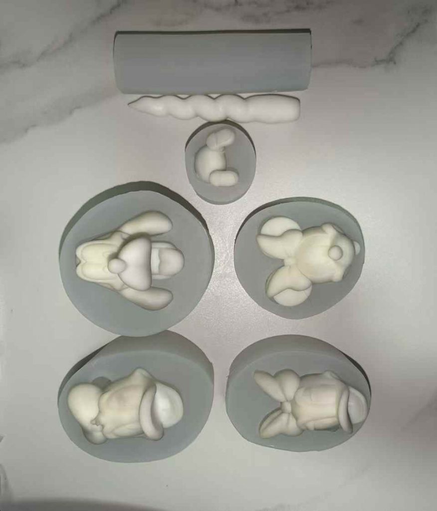 Precision 3D silicone molded botanical food and fruit shaped soy candles for custom OEM gift brand production.