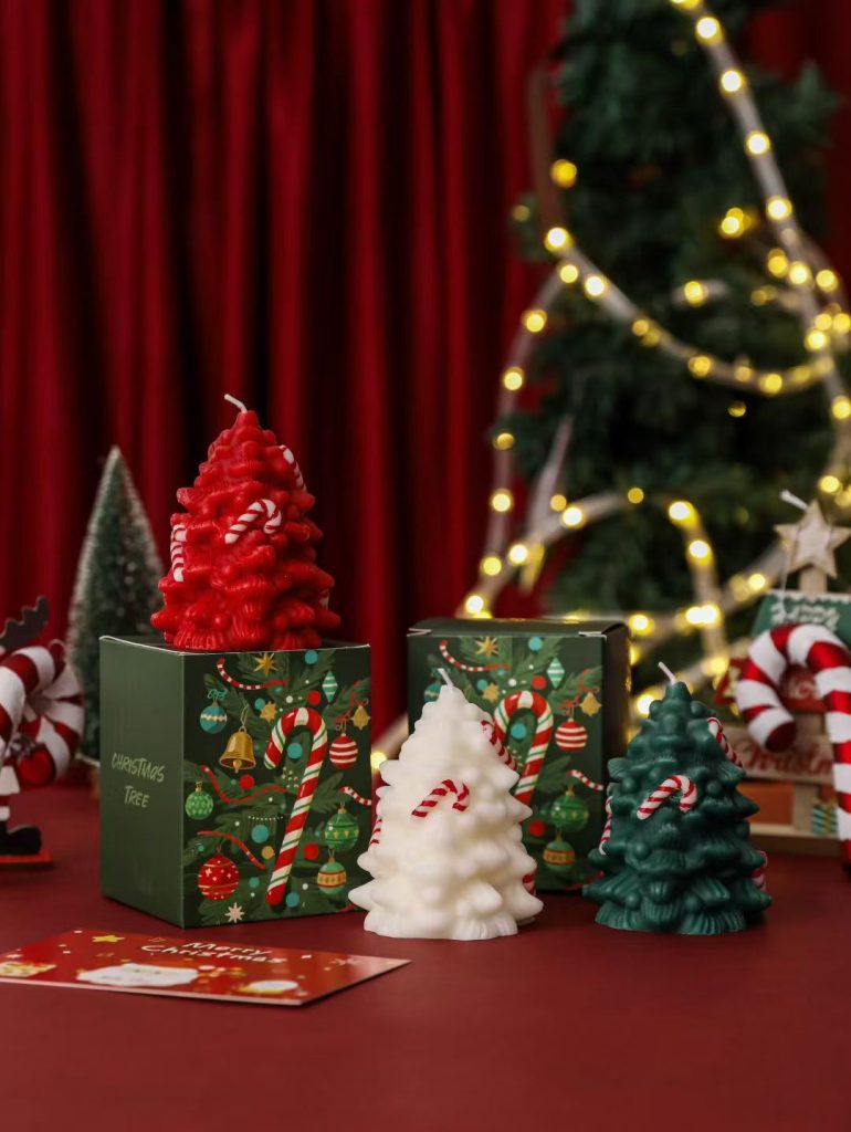 Tiered pine Christmas tree and candy cane novelty soy candles with custom printed retail packaging.